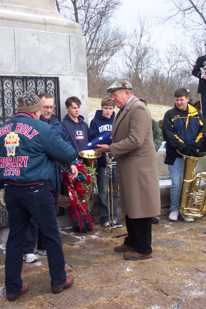 Mayor Rolfes accepts the American flag from members of the Most Holy Rosary, Knights of Columbus, Harrison, Ohio.