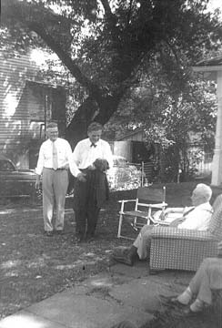 Mr. Fischer, Gov. Frank Lausche and sitting, W.W. Taylor. Taylor High School is named after Mr. Taylor.